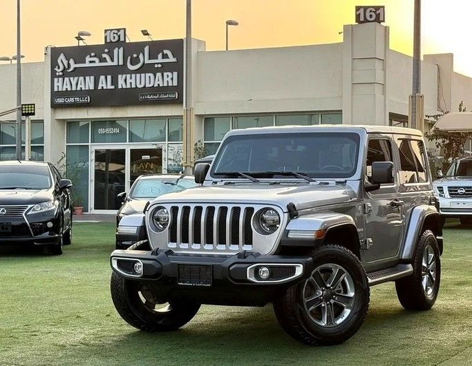 Подержанный Jeep Wrangler IV (JL), 3.6 л, 2021 в Шардже от Hayan Alkhudari Used Cars Серый цвет. GCC | AUTO.AE