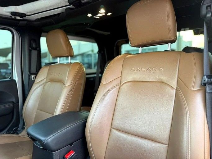 Подержанный Jeep Wrangler IV (JL), 3.6 л, 2021 в Шардже от Hayan Alkhudari Used Cars Серый цвет. GCC | AUTO.AE