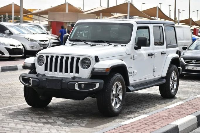 Подержанный Jeep Wrangler IV (JL), 2.0 л, 2020 в Шардже от Alfaris Used Cars Белый цвет. Other | AUTO.AE