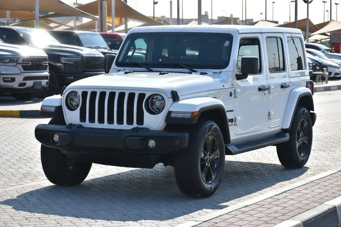 Used Jeep Wrangler IV (JL), 2.0 l, 2021 in Sharjah by Alfaris Used Cars, White color. Other | AUTO.AE