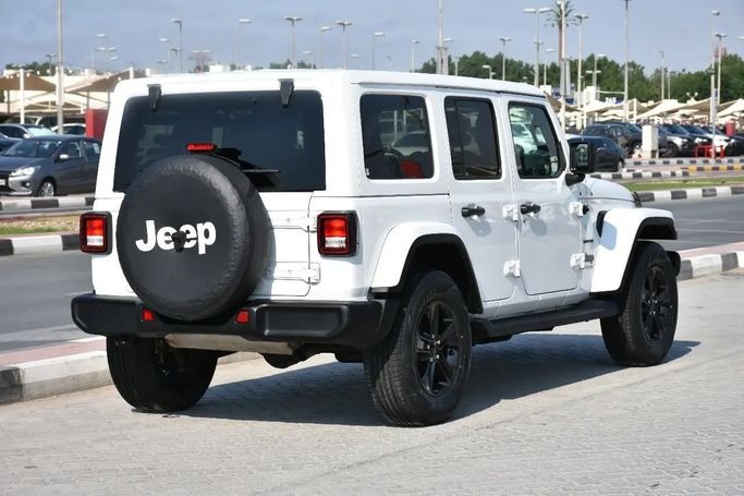 Used Jeep Wrangler IV (JL), 2.0 l, 2021 in Sharjah by Alfaris Used Cars, White color. Other | AUTO.AE