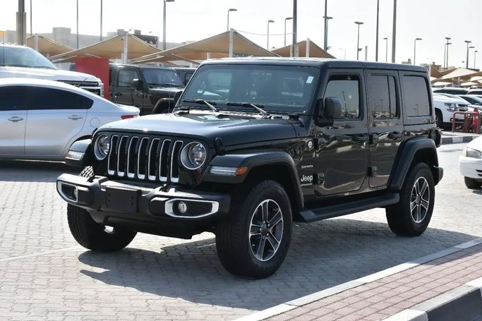 Подержанный Jeep Wrangler IV (JL), 2.0 л, 2023 в Шардже от Alfaris Used Cars Черный цвет. Other | AUTO.AE