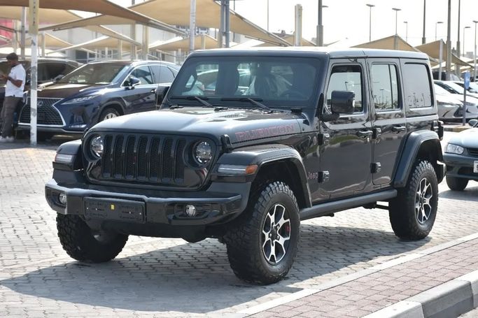 Подержанный Jeep Wrangler IV (JL), 2.0 л, 2023 в Шардже от Alfaris Used Cars Черный цвет. Other | AUTO.AE