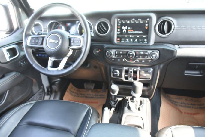 Used Jeep Wrangler IV (JL), 2.0 l, 2022 in Sharjah by Alfaris Used Cars, Grey color. Other | AUTO.AE