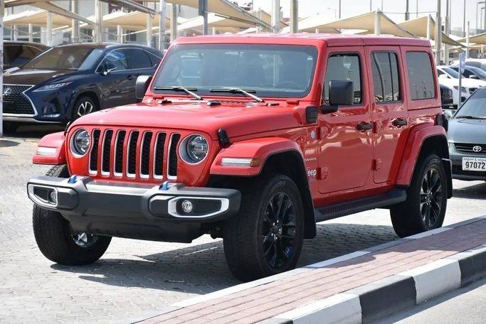 Подержанный Jeep Wrangler IV (JL), 2.0 л, 2022 в Шардже от Alfaris Used Cars Красный цвет. Other | AUTO.AE