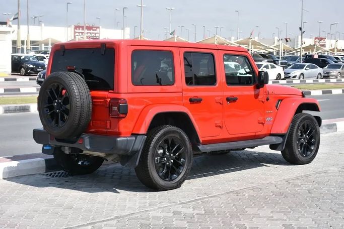 Подержанный Jeep Wrangler IV (JL), 2.0 л, 2022 в Шардже от Alfaris Used Cars Красный цвет. Other | AUTO.AE