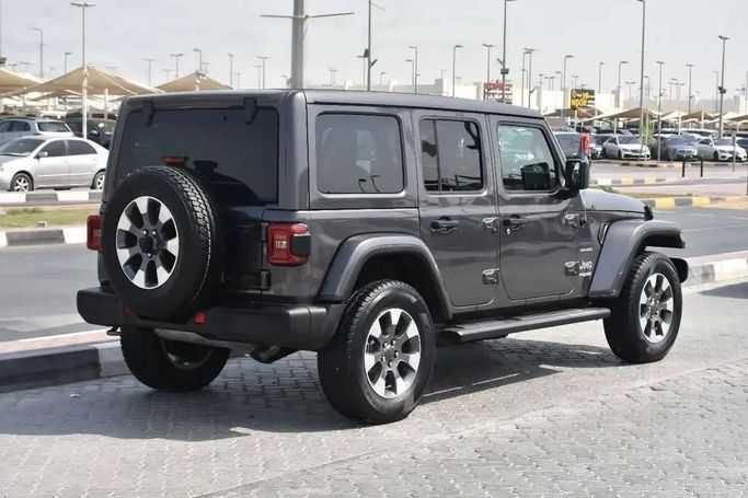 Подержанный Jeep Wrangler IV (JL), 3.6 л, 2021 в Шардже от Alfaris Used Cars Серый цвет. Other | AUTO.AE
