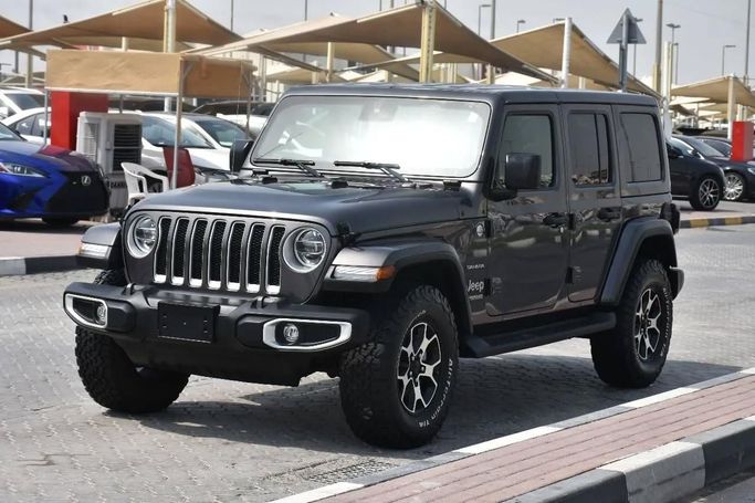 Подержанный Jeep Wrangler IV (JL), 3.6 л, 2022 в Шардже от Alfaris Used Cars Серый цвет. Other | AUTO.AE