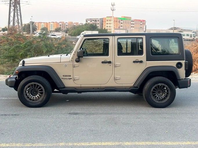 Used Jeep Wrangler IV (JL), 3.6 l, 2018 in Sharjah by Almasar Used Cars, Beige color. GCC Specs | AUTO.AE