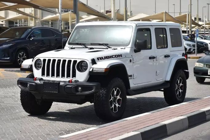 Used Jeep Wrangler IV (JL), 3.6 l, 2022 in Sharjah by Alfaris Used Cars, White color. Other | AUTO.AE
