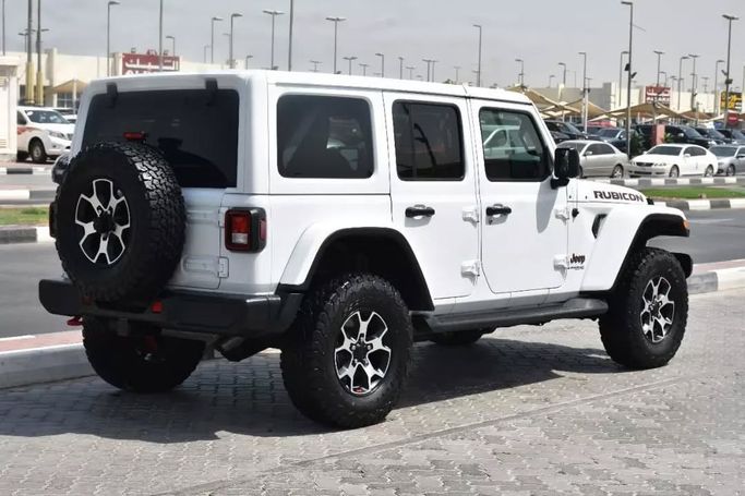 Used Jeep Wrangler IV (JL), 3.6 l, 2022 in Sharjah by Alfaris Used Cars, White color. Other | AUTO.AE