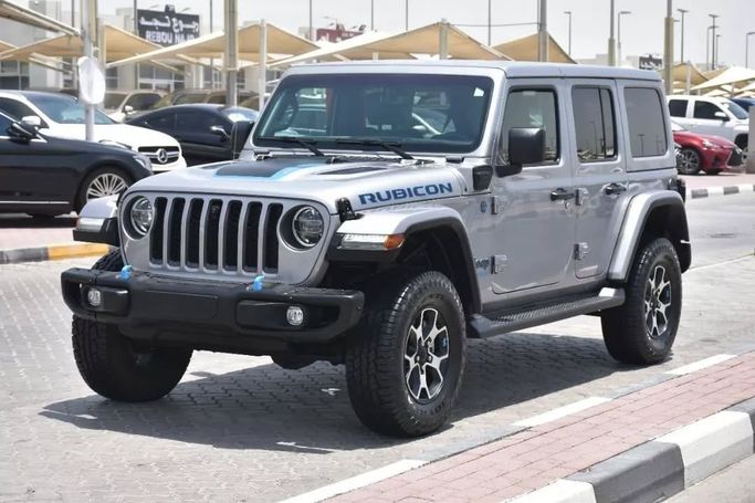 Used Jeep Wrangler IV (JL), 2.0 l, 2021 in Sharjah by Alfaris Used Cars, Silver color. Other | AUTO.AE