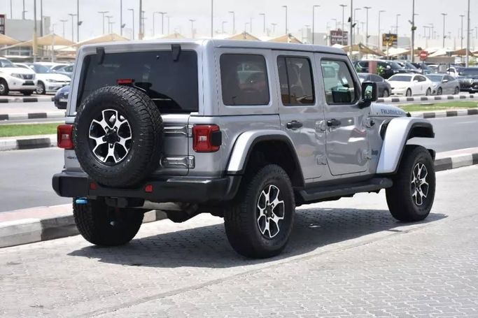 Used Jeep Wrangler IV (JL), 2.0 l, 2021 in Sharjah by Alfaris Used Cars, Silver color. Other | AUTO.AE