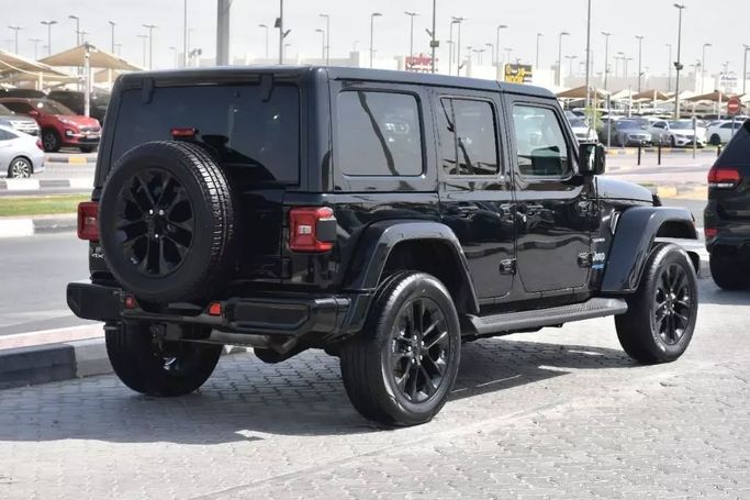 Подержанный Jeep Wrangler IV (JL), 2.0 л, 2021 в Шардже от Alfaris Used Cars Черный цвет. Other | AUTO.AE