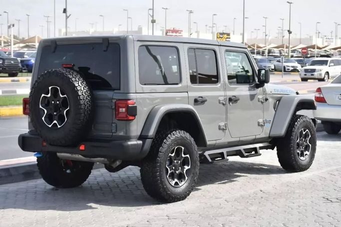 Used Jeep Wrangler IV (JL), 2.0 l, 2021 in Sharjah by Alfaris Used Cars, Grey color. Other | AUTO.AE