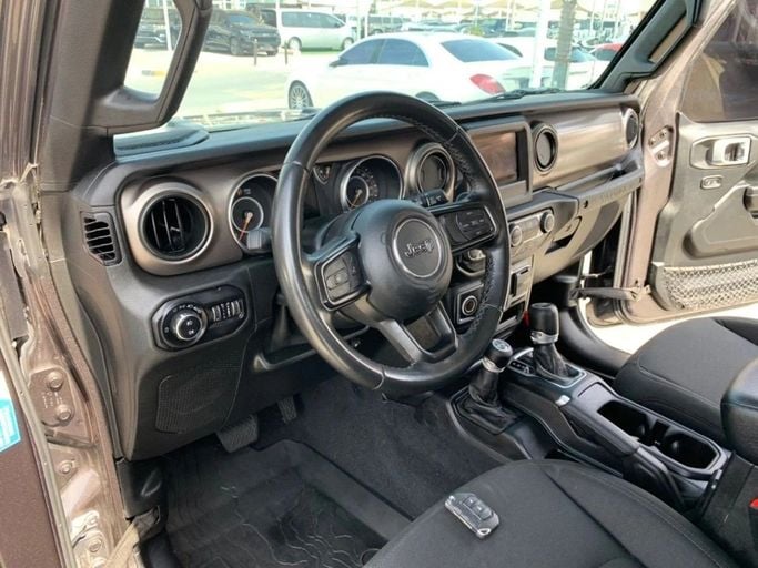 Used Jeep Wrangler IV (JL), 3.6 l, 2020 in Sharjah by Titanium Used Cars, Grey color. GCC Specs | AUTO.AE