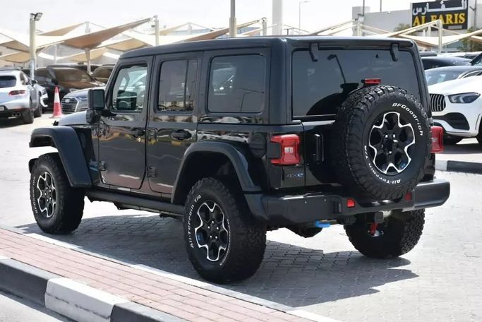 Used Jeep Wrangler IV (JL), 2.0 l, 2022 in Sharjah by Alfaris Used Cars, Black color. Other | AUTO.AE