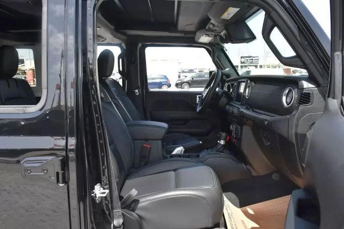 Used Jeep Wrangler IV (JL), 2.0 l, 2022 in Sharjah by Alfaris Used Cars, Black color. Other | AUTO.AE