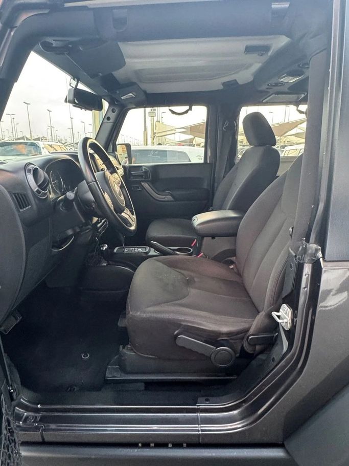 Подержанный Jeep Wrangler IV (JL), 3.6 л, 2018 в Шардже от Titanium Used Cars Черный цвет. GCC | AUTO.AE