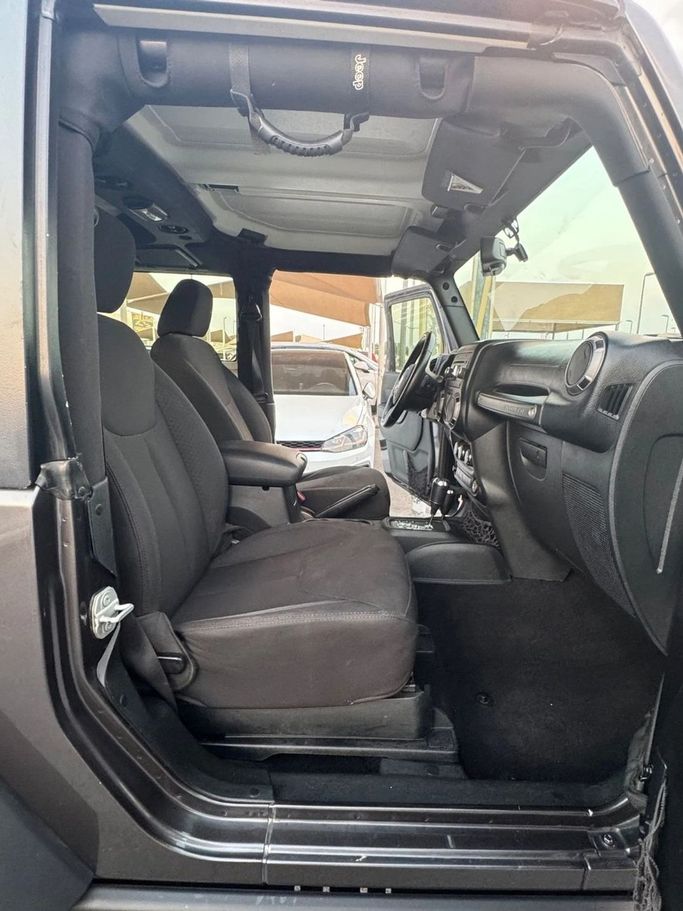 Подержанный Jeep Wrangler IV (JL), 3.6 л, 2018 в Шардже от Titanium Used Cars Черный цвет. GCC | AUTO.AE