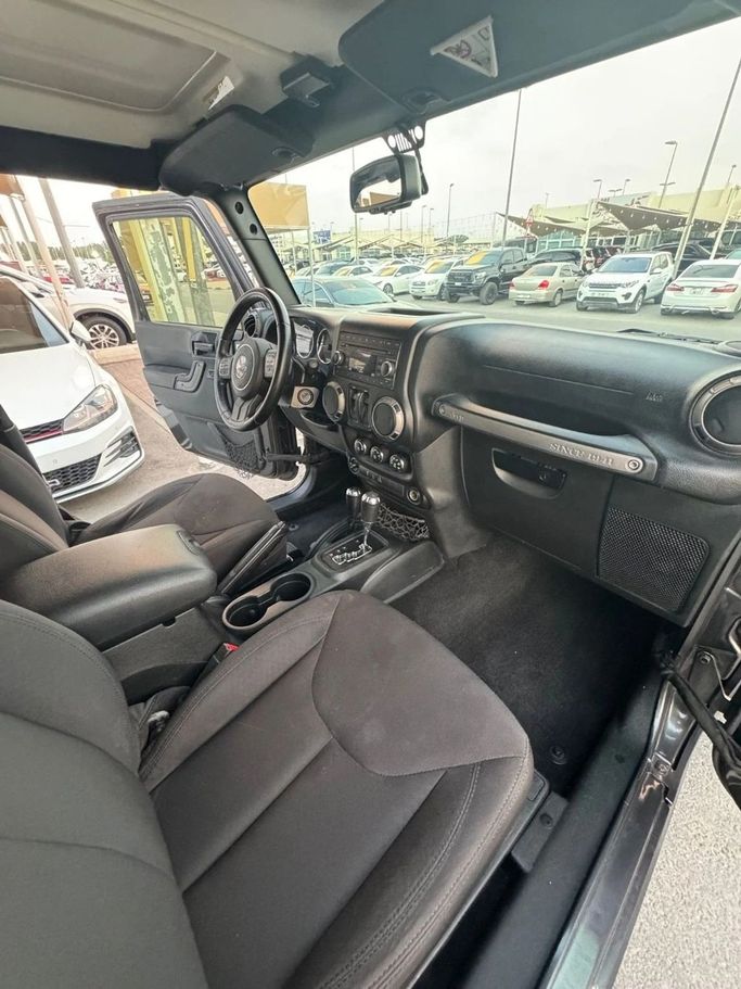 Подержанный Jeep Wrangler IV (JL), 3.6 л, 2018 в Шардже от Titanium Used Cars Черный цвет. GCC | AUTO.AE