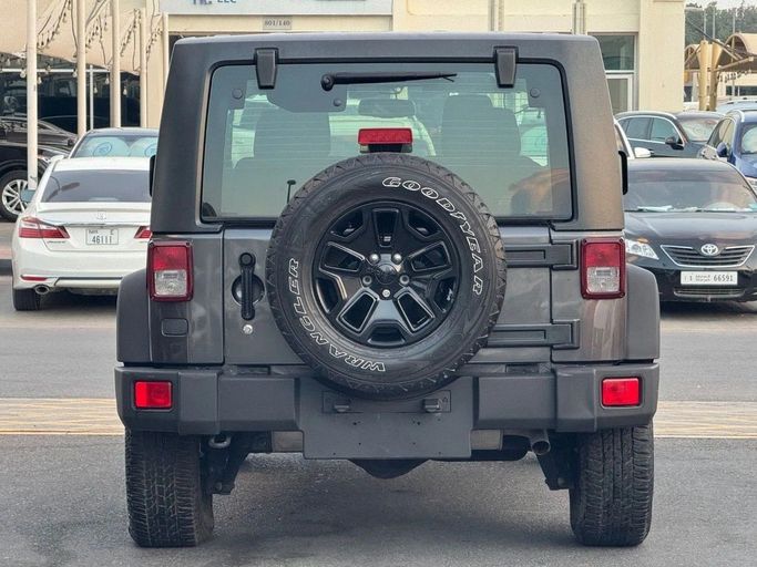 Подержанный Jeep Wrangler IV (JL), 3.6 л, 2018 в Шардже от Titanium Used Cars Черный цвет. GCC | AUTO.AE