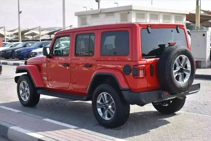 Used Jeep Wrangler IV (JL), 3.6 l, 2022 in Sharjah by Alfaris Used Cars, Red color. Other | AUTO.AE