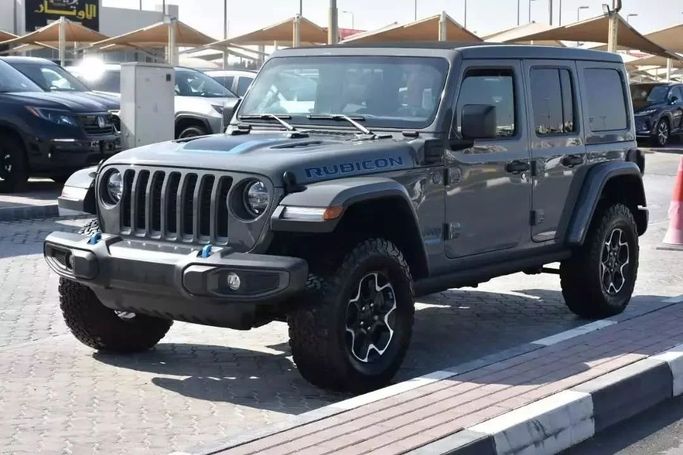 Used Jeep Wrangler IV (JL), 2.0 l, 2022 in Sharjah by Alfaris Used Cars, Grey color. Other | AUTO.AE