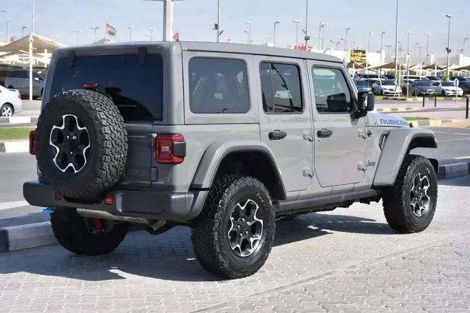Used Jeep Wrangler IV (JL), 2.0 l, 2022 in Sharjah by Alfaris Used Cars, Grey color. Other | AUTO.AE