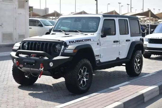 Used Jeep Wrangler Rubicon IV (JL), 2.1 l, 2022 in Sharjah by Alfaris Used Cars, White color. Other | AUTO.AE