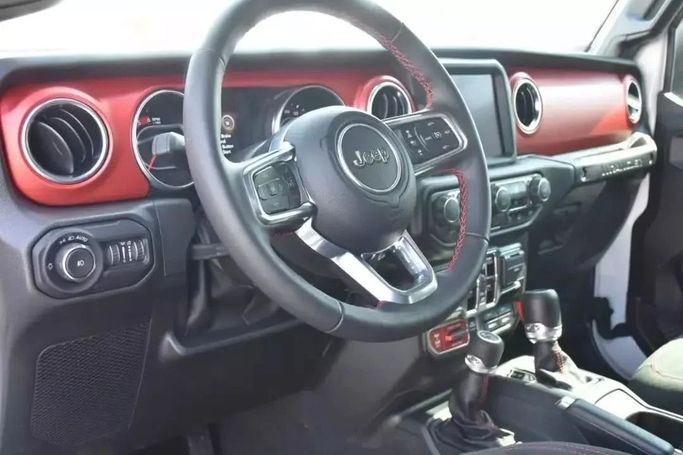 Used Jeep Wrangler Rubicon IV (JL), 2.1 l, 2022 in Sharjah by Alfaris Used Cars, White color. Other | AUTO.AE