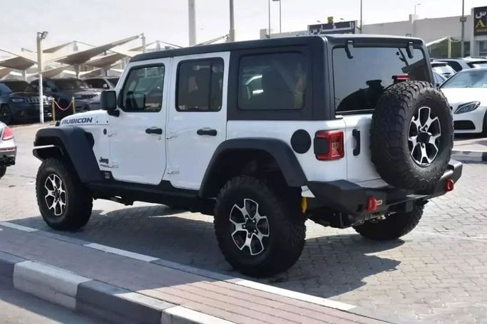 Used Jeep Wrangler Rubicon IV (JL), 2.1 l, 2022 in Sharjah by Alfaris Used Cars, White color. Other | AUTO.AE