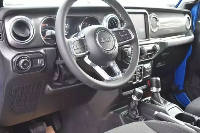 Used Jeep Wrangler IV (JL), 3.6 l, 2023 in Sharjah by Alfaris Used Cars, Blue color. Other | AUTO.AE