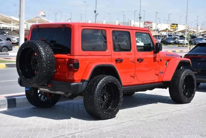Used Jeep Wrangler IV (JL), 2.0 l, 2021 in Sharjah by Alfaris Used Cars, Red color. Other | AUTO.AE