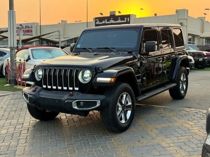 Подержанный Jeep Wrangler IV (JL), 2.0 л, 2023 в Шардже от Al Fakhamah Used Cars Черный цвет. Канадская | AUTO.AE