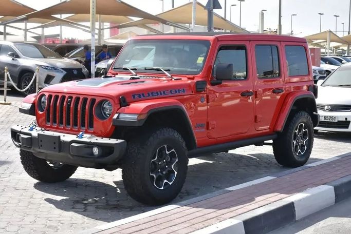 Подержанный Jeep Wrangler Rubicon IV (JL), 2.0 л, 2022 в Шардже от Alfaris Used Cars Красный цвет. Other | AUTO.AE