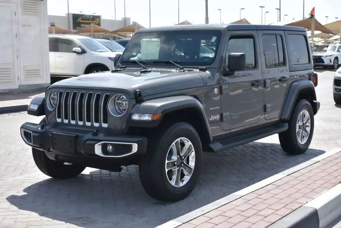 Подержанный Jeep Wrangler IV (JL), 3.6 л, 2021 в Шардже от Alfaris Used Cars Серый цвет. Other | AUTO.AE