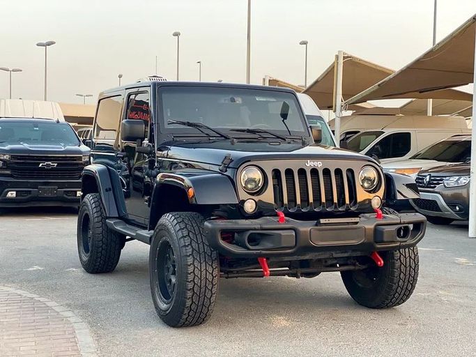 Подержанный Jeep Wrangler III (JK), 3.8 л, 2017 в Шардже от Al Saqr Al Mutaliq Черный цвет. GCC | AUTO.AE