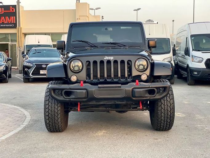 Подержанный Jeep Wrangler III (JK), 3.8 л, 2017 в Шардже от Al Saqr Al Mutaliq Черный цвет. GCC | AUTO.AE