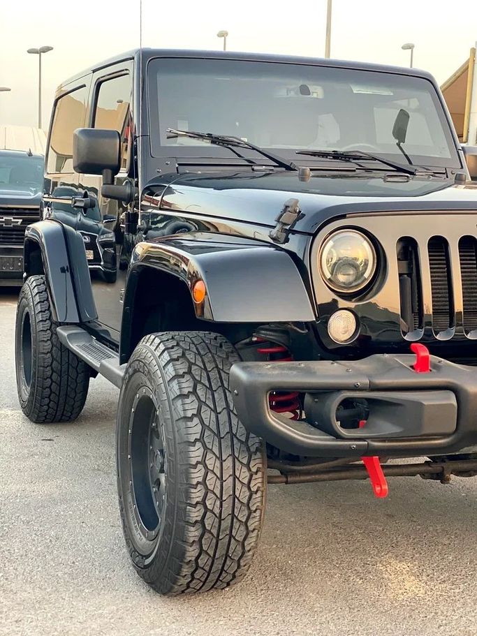 Подержанный Jeep Wrangler III (JK), 3.8 л, 2017 в Шардже от Al Saqr Al Mutaliq Черный цвет. GCC | AUTO.AE