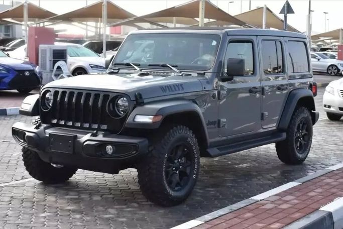 Подержанный Jeep Wrangler IV (JL), 3.6 л, 2021 в Шардже от Alfaris Used Cars Серый цвет. Other | AUTO.AE
