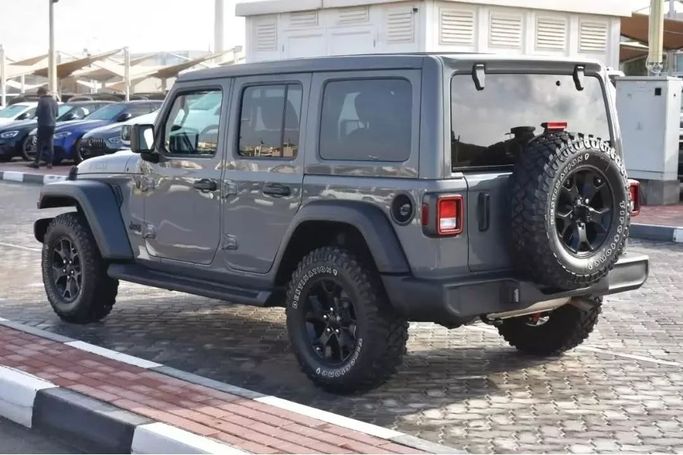 Подержанный Jeep Wrangler IV (JL), 3.6 л, 2021 в Шардже от Alfaris Used Cars Серый цвет. Other | AUTO.AE