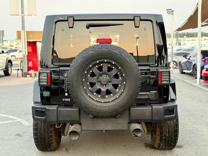 Подержанный Jeep Wrangler III (JK), 3.6 л, 2017 в Шардже от Hamsat Waad Черный цвет. GCC | AUTO.AE
