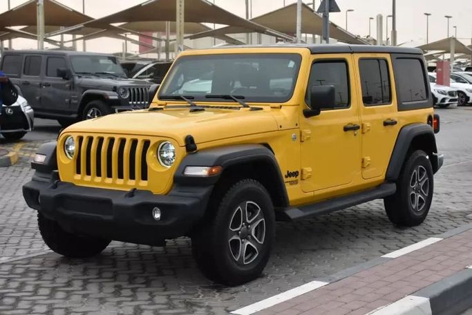 Подержанный Jeep Wrangler IV (JL), 2.0 л, 2021 в Шардже от Alfaris Used Cars Желтый цвет. Other | AUTO.AE