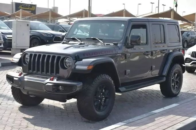 Подержанный Jeep Wrangler IV (JL), 3.6 л, 2021 в Шардже от Alfaris Used Cars Серый цвет. Other | AUTO.AE