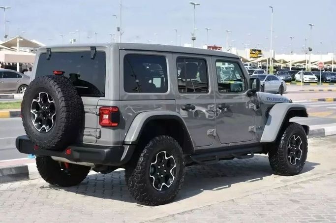 Подержанный Jeep Wrangler IV (JL), 2.0 л, 2021 в Шардже от Alfaris Used Cars Серый цвет. Other | AUTO.AE