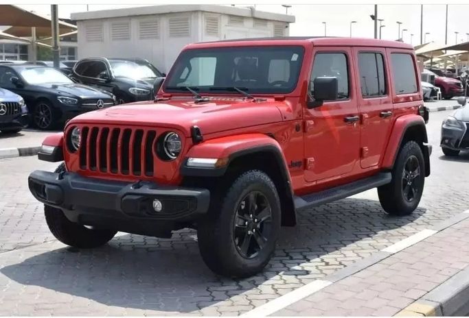 Подержанный Jeep Wrangler IV (JL), 3.6 л, 2022 в Шардже от Alfaris Used Cars Красный цвет. Other | AUTO.AE