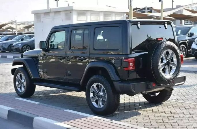 Подержанный Jeep Wrangler IV (JL), 3.6 л, 2022 в Шардже от Alfaris Used Cars Зеленый цвет. Other | AUTO.AE