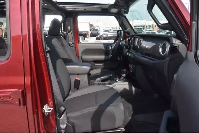Подержанный Jeep Wrangler IV (JL), 2.0 л, 2022 в Шардже от Alfaris Used Cars Красный цвет. Other | AUTO.AE