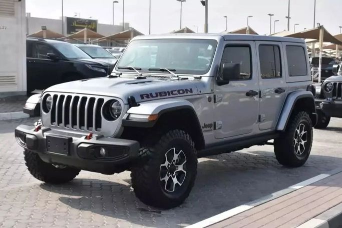 Подержанный Jeep Wrangler Rubicon IV (JL), 2.1 л, 2021 в Шардже от Alfaris Used Cars Серый цвет. Other | AUTO.AE